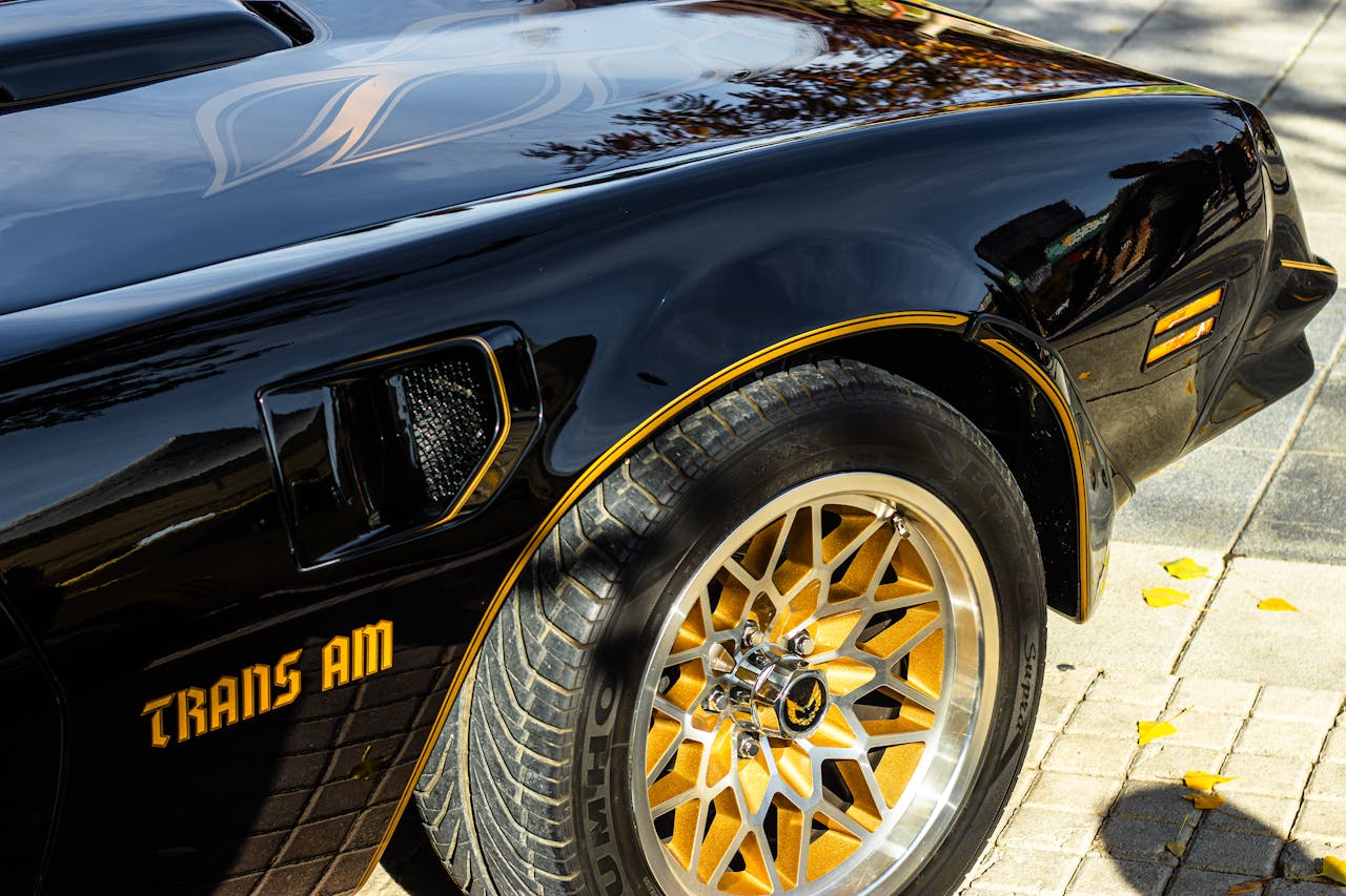 Close-up of a classic black Pontiac Trans Am showcasing its distinctive design in Ankara, Türkiye.